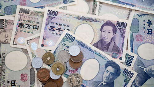 Japanese Yen money. close up of the Japanese yen on hand. currency of Japan that is used to change, buy, sell, accumulate, invest, financial, exchange rate, value, accounting, international exchange