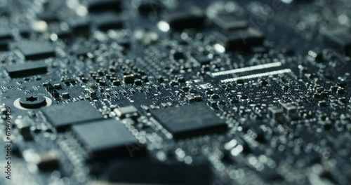 Electronic chip component on the blue printed pcb. Concept of computer hardware and digital computing of big data. Integrated circuit board with processor close up.