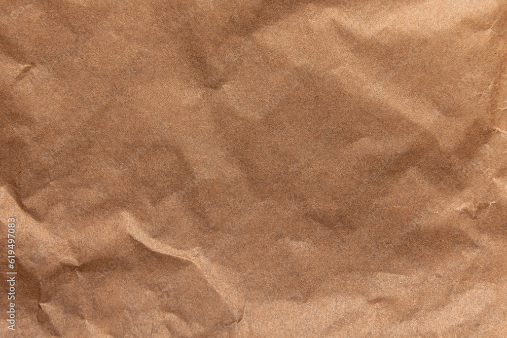 Naklejka premium Abstract Crumpled And Creased Recycle Brown Paper Texture Background