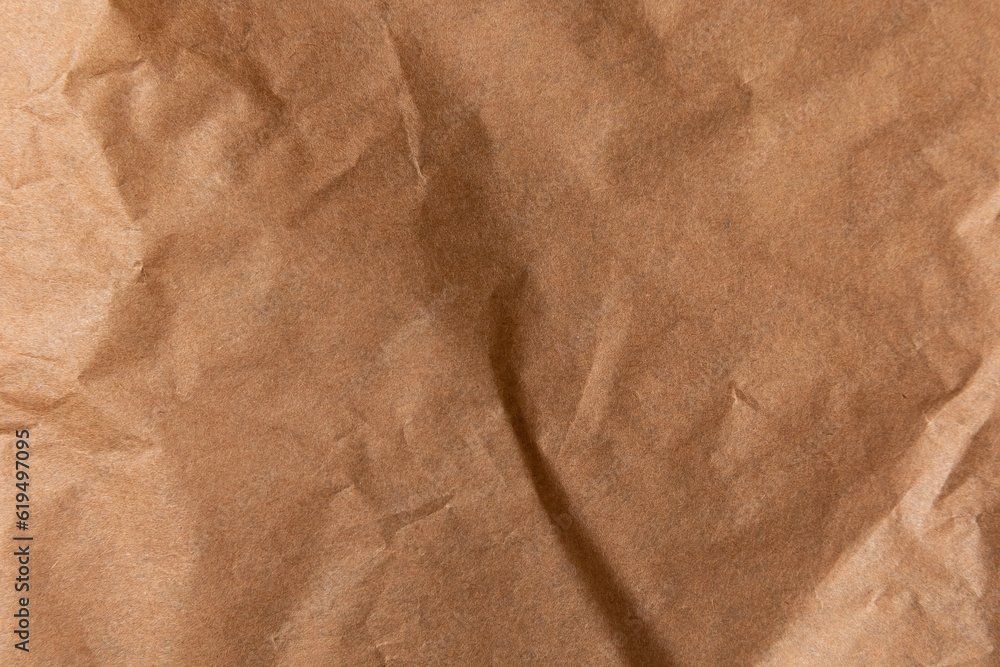 Naklejka premium Abstract Crumpled And Creased Recycle Brown Paper Texture Background