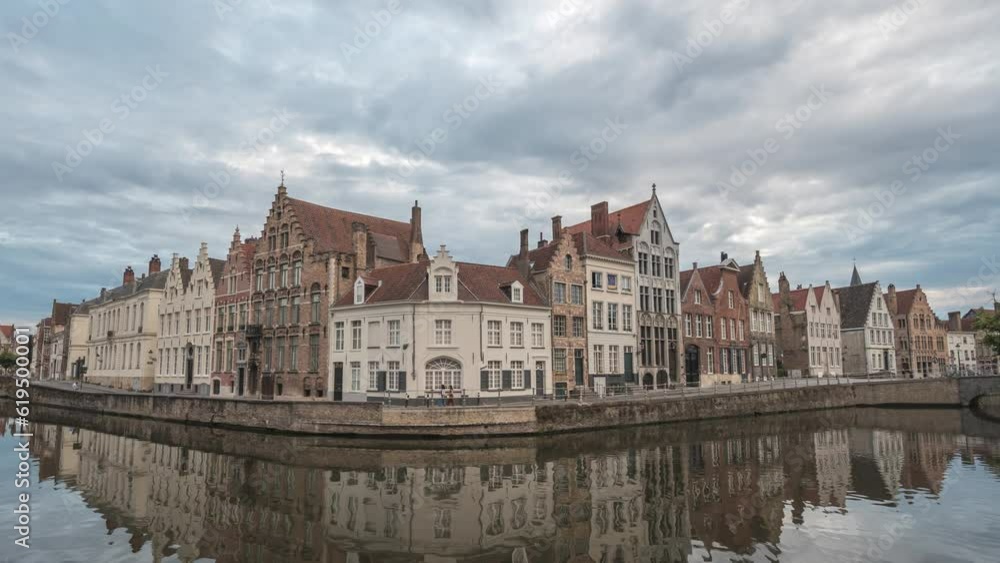 Bruges Belgium time lapse 4K, city skyline day to night timelapse at Spiegelrei Canal with King's Bridge (Koningsbrug) Bruges Belgium time lapse 4K, city skyline day to night timelapse at Spiegelrei Canal with King's Bridge (Koningsbrug)