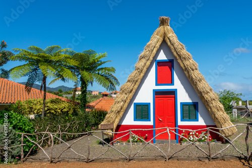 Tourism office in a traditional triangular madeiran house in the island of Madeira, Portugal photo