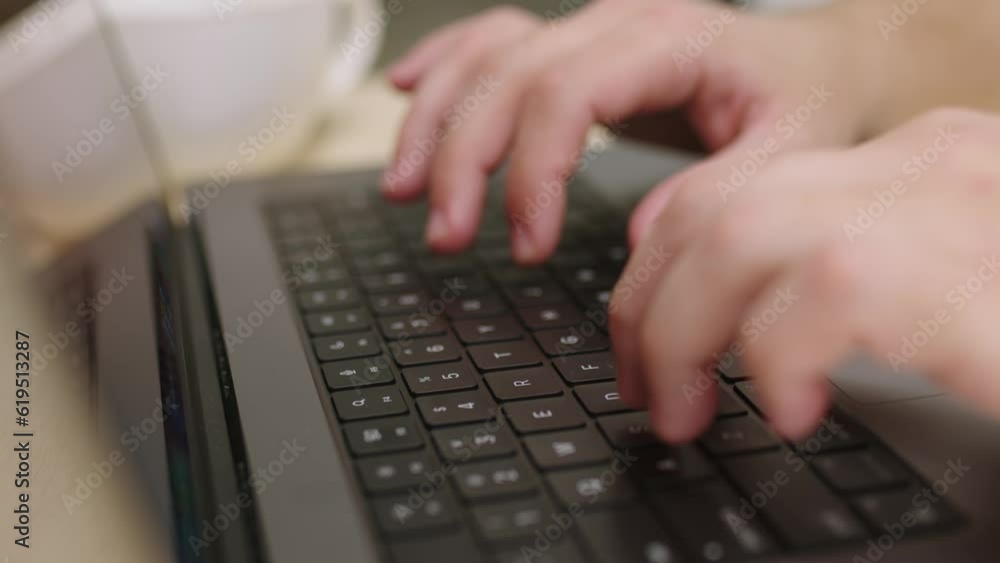 Camera slides around freelancer's hands typing on laptop keyboard in slow motion. Businessman working at office with internet. Man searches new job on internet at coffeeshop. Business concept. Camera slides around freelancer's hands typing on laptop keyboard in slow motion. Businessman working at office with internet. Man searches new job on internet at coffeeshop. Business concept.