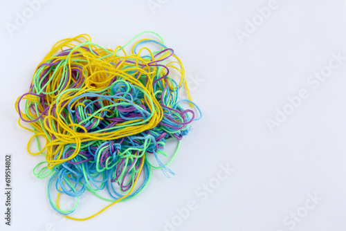multi color tangled thread isolated on white background