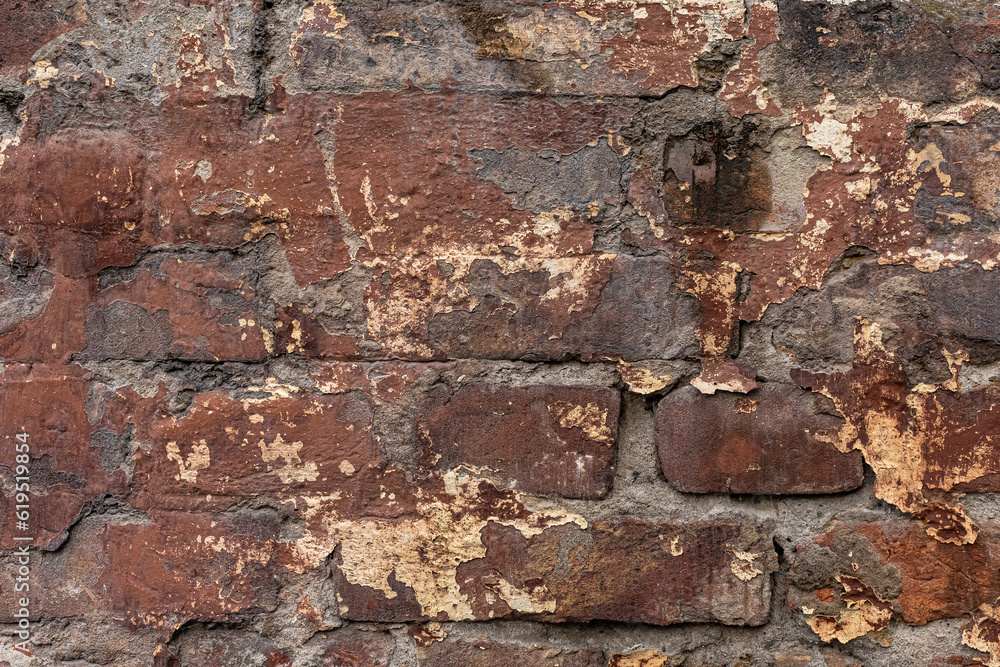 Red, White, Green, Pink, Paint, Mold, Wall Background. Old Grungy Brickwork Horizontal Texture. Brickwall Backdrop. Structure With Broken Stucco And Plaster. Red, White, Green, Pink, Paint, Mold, Wall Background. Old Grungy Brickwork Horizontal Texture. Brickwall Backdrop. Structure With Broken Stucco And Plaster.