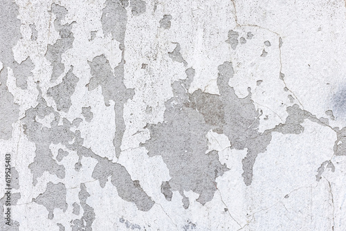 White Street Wall Texture Background. Painted Distressed Wall Surface. Grunge Background. Shabby Building Facade With Damaged Plaster. 