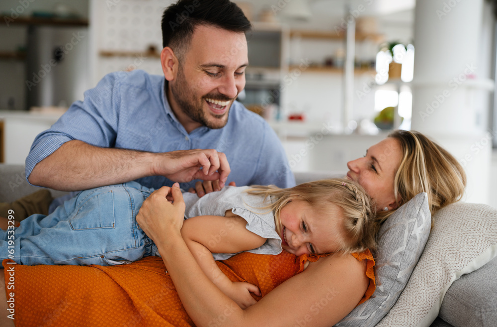 Happy family at home spending time together. People happiness child concept Happy family at home spending time together. People happiness child concept