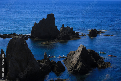 People practicing canoeing on the Sirens Reef in Cabo de Gata