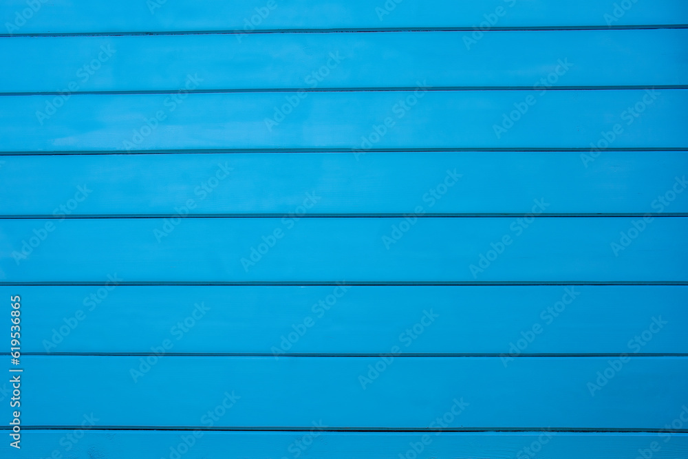 Obraz premium blue background made of painted wooden boards. High quality photo