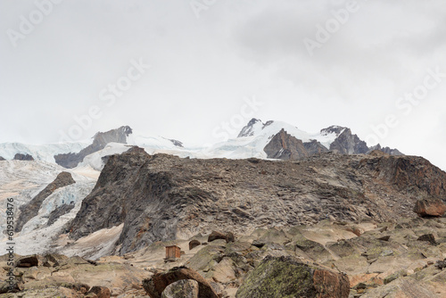 Panorama view with mountain summit Nordend  left  and Dufourspitze  right  in mountain massif Monte Rosa in Pennine Alps  Switzerland