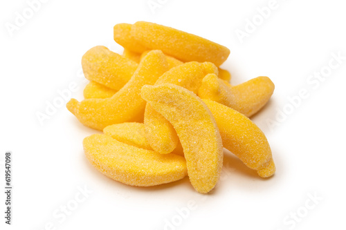 Juicy colorful jelly banana sweets isolated on white.