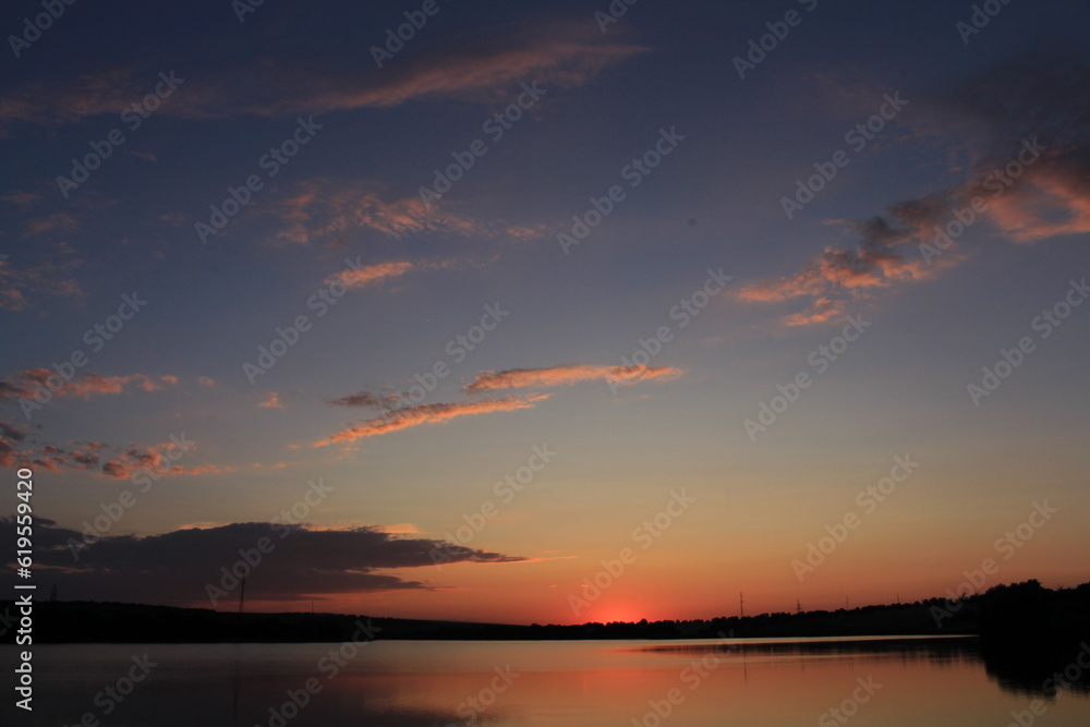 Fototapeta premium A sunset over a lake