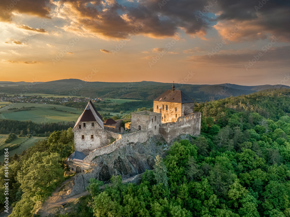 Aerial view of Zebrak castles on opposite hillsides from Tocnik in Bohemia during sunset