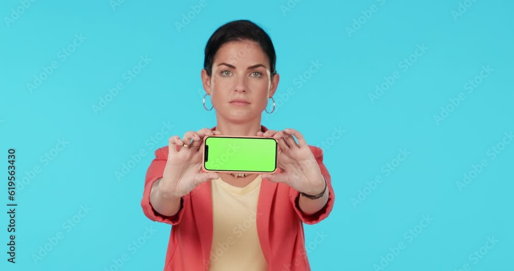 Green screen phone, studio face and serious woman show mockup design, online presentation and mobile app space. Portrait, smartphone UI software and person with digital tech logo on blue background Green screen phone, studio face and serious woman show mockup design, online presentation and mobile app space. Portrait, smartphone UI software and person with digital tech logo on blue background