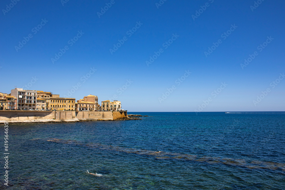 View of Ortigia peninsula during the summer in Siracusa, Italy