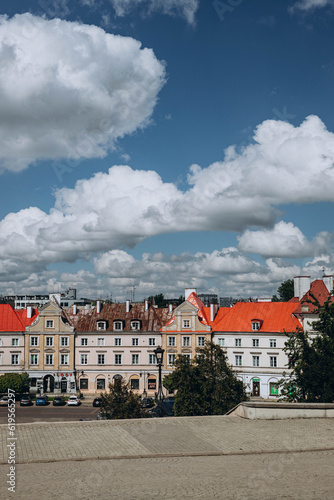 Lublin, Poland- May 10, 2023: view to the city from Main Entrance Gate of the Neo-gothic Part of Lublin Castle. medieval renovated buildings, architecture in sunny spring day.