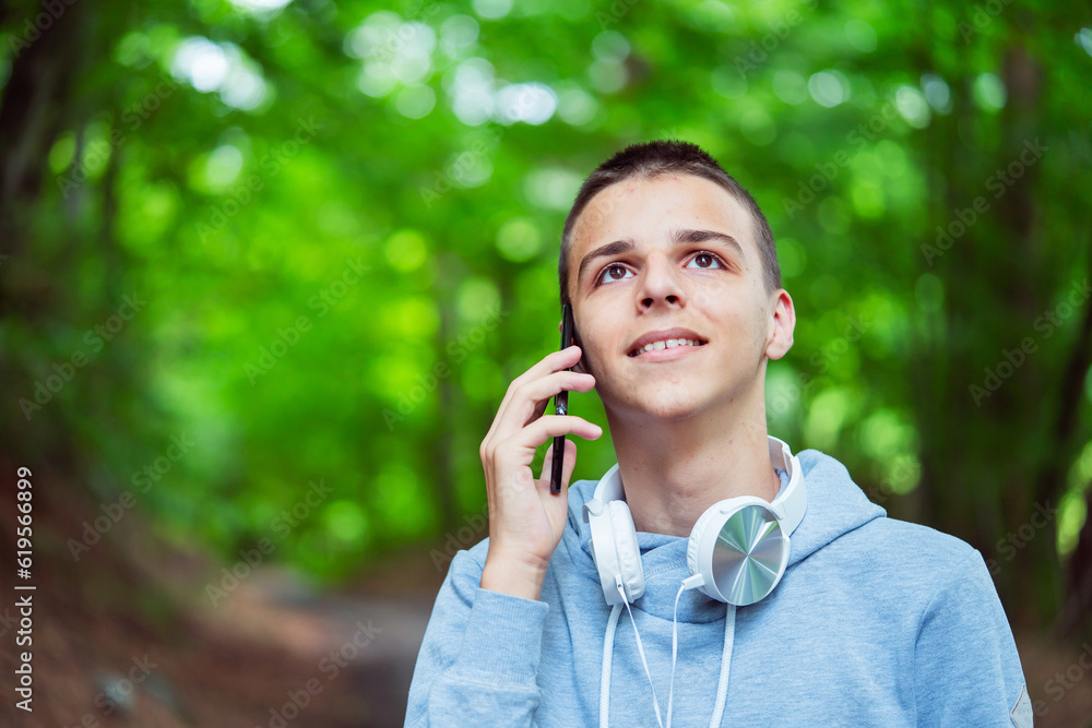 photo boy with a mobile phone in various poses, the concept of modern life photo boy with a mobile phone in various poses, the concept of modern life