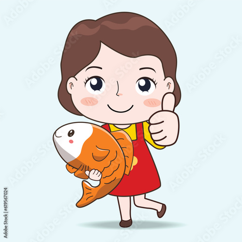 female in overalls holding a big fish whole body and raising her hands is awesome.