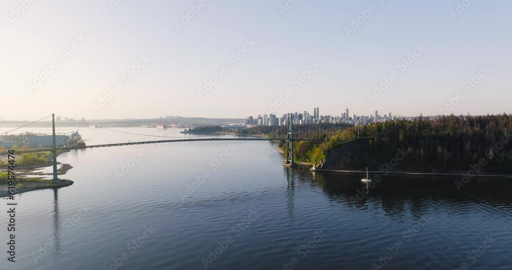 Aerial view of Lions Gate Bridge and Stanley Park at dawn. Canada Aerial view of Lions Gate Bridge and Stanley Park at dawn. Canada
