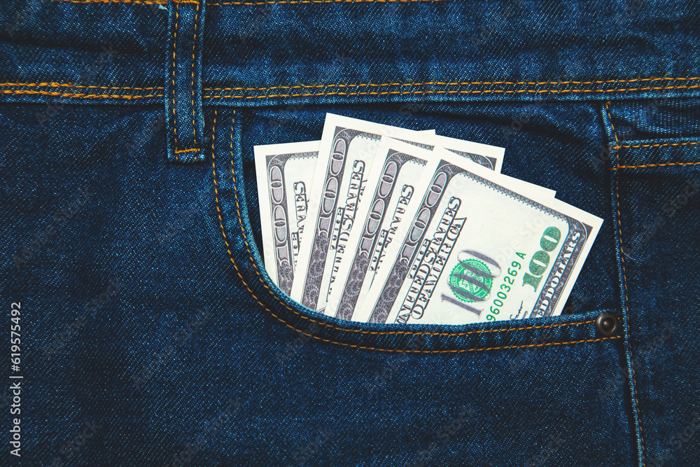 Money in the pocket of blue jeans. Money in the pocket of blue jeans.