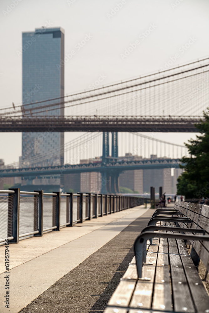 Brooklyn Park benches with Manhattan Bridge background.