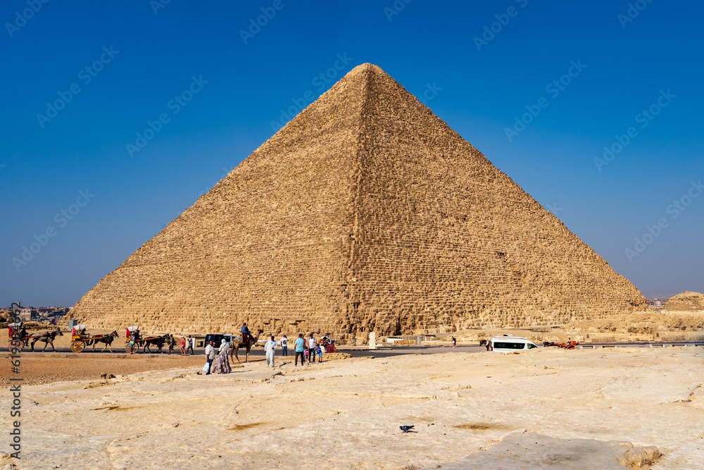 The Giza pyramid complex,  Giza necropolis is home to the Great Pyramid, the Pyramid of Khafre, and the Great Sphinx in Cairo, Egypt.  Travel and history.