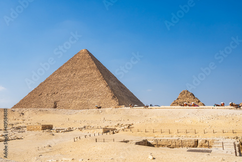 The Giza pyramid complex   Giza necropolis is home to the Great Pyramid  the Pyramid of Khafre  and the Great Sphinx in Cairo  Egypt.  Travel and history.