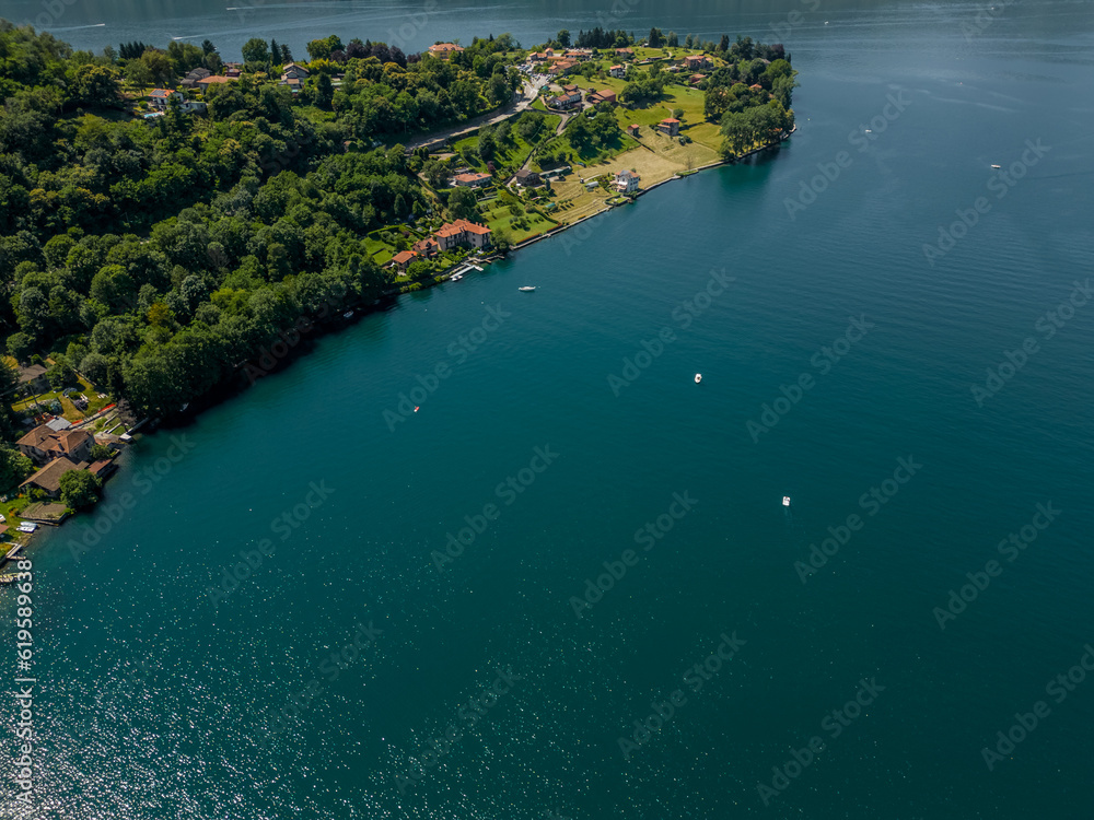 Nature of Italy Lake Orta view from a drone. Aerial View Forest Landscape in Summertime Day. Concept Wildlife and Nature Wide Shot 4k.