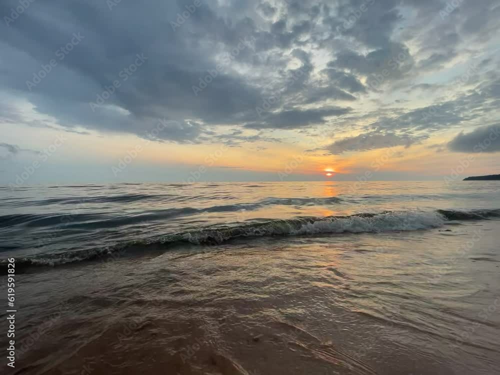 Beach sunset, nature's beauty in motion, water sports, tranquil shore, dramatic sky. Beach sunset, nature's beauty in motion, water sports, tranquil shore, dramatic sky.