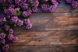 Rustic wooden texture complemented by a vibrant lilac flower arrangement. Generative AI