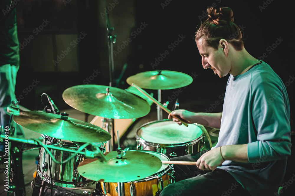 Obraz premium Drum music band drummer artist have solo live performance on a stage. Repetition and practice