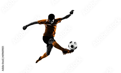 Young professional soccer player hitting ball