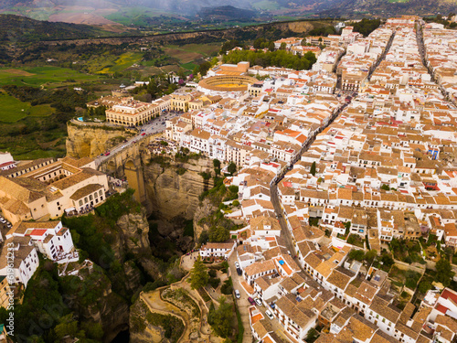 Aerial view of Ronda landscape and buildings with Puente Nuevo Bridge, Andalusia, Spain photo