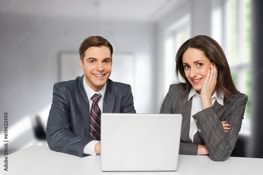 Happy business people discussion in modern office Happy business people discussion in modern office