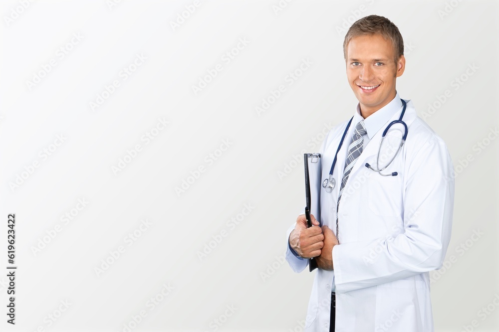 Portrait of handsome young doctor posing Portrait of handsome young doctor posing