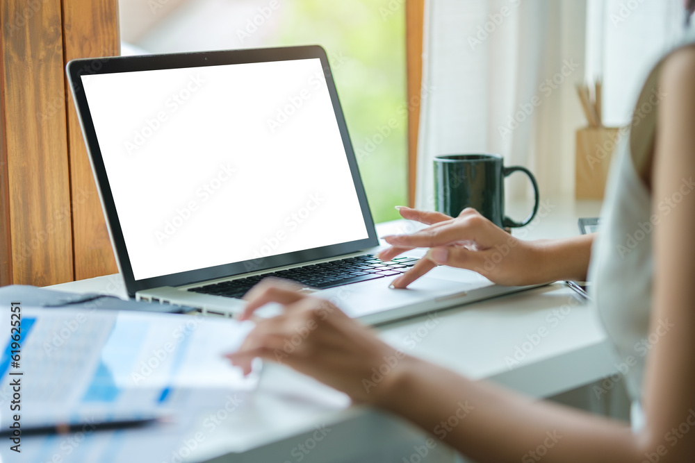 Close up view businesswoman hands typing on keyboard of laptop computer. Close up view businesswoman hands typing on keyboard of laptop computer.