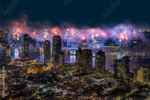 Aerial View of Macy's NYC 4th of July Fireworks NYC Skyline Long Island City buildings purple red