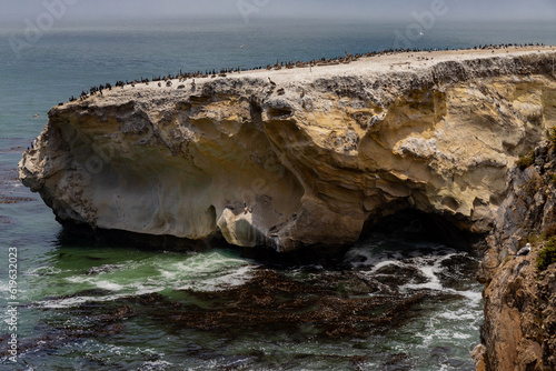 Sea Stacks near Dinosaur Caves Park. A beautiful view of an ocean surrounded by cliffs in Dinosaur Caves Park, Pismo Beach, California, United States