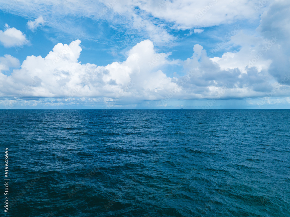 Aerial view of a blue sea surface water texture background,Amazing sun reflections,Aerial flying over sea drone view,Waves water surface texture ocean,Open sea background Aerial view of a blue sea surface water texture background,Amazing sun reflections,Aerial flying over sea drone view,Waves water surface texture ocean,Open sea background