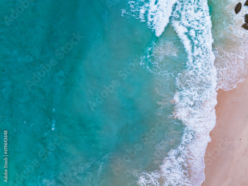 Top view of Waves crashing on sandy shore,Sea ocean background