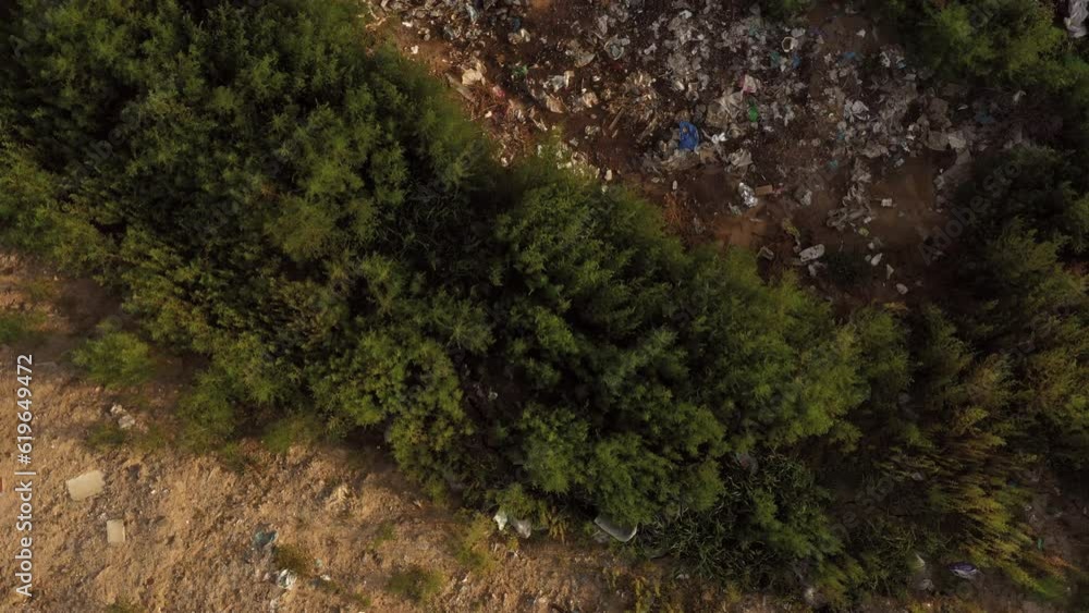 Top view of a large pile of garbage in a countryside field. Bad ecology and enviroment pollution concept. Top view of a large pile of garbage in a countryside field. Bad ecology and enviroment pollution concept.