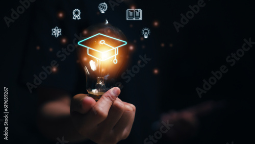 Fotografiet Hands showing graduation hat, Internet education course degree, E-learning graduate certificate program concept