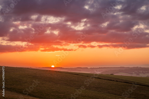 July sunset over the south downs from Falmer Road Brighton East Sussex south east England UK © SuxxesPhoto