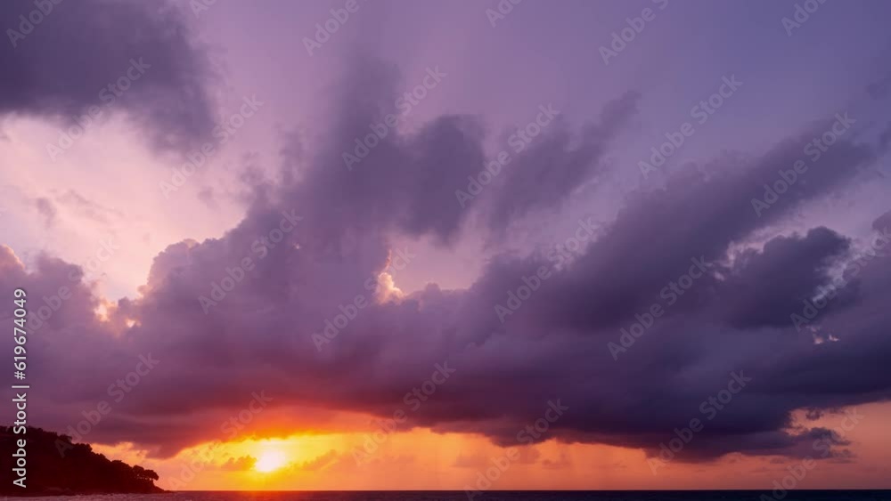 Colorful clouds over sea background,Beautiful 4K Time lapse of Majestic sunset clouds sky landscape,Amazing light of nature cloudscape sunset or sunrise sky Colorful clouds over sea background,Beautiful 4K Time lapse of Majestic sunset clouds sky landscape,Amazing light of nature cloudscape sunset or sunrise sky