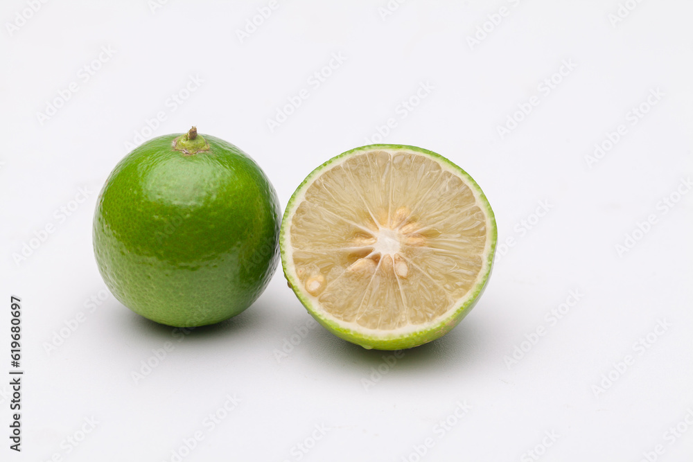 fresh lemons on plate on a white background fresh lemons on plate on a white background