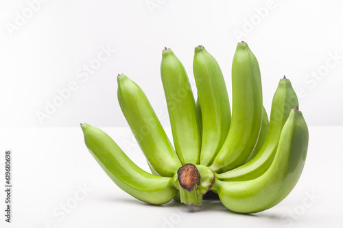Bunch of fresh green banana isolated on white background.