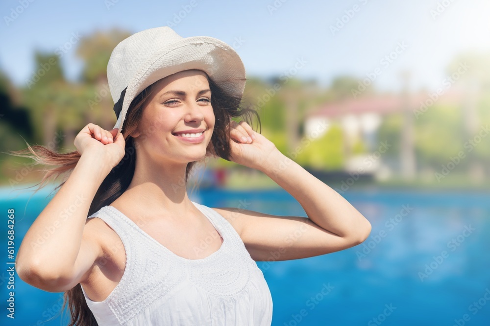 Happy tourist woman at summer vacation