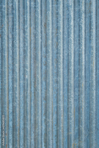 Rusty zinc corrugated iron metal siding for vintage background textured.