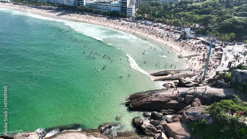 Aerial view of Diabo beach and Ipanema beach, Pedra do Arpoador. People sunbathing and playing on the beach, sea sports. Rio de Janeiro. Brazil photo