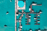 Yacht club at Chalong bay, Phuket, Thailand. Aerial view of the yacht parking, A marina lot, Yacht and sailboat is moored at the quay.